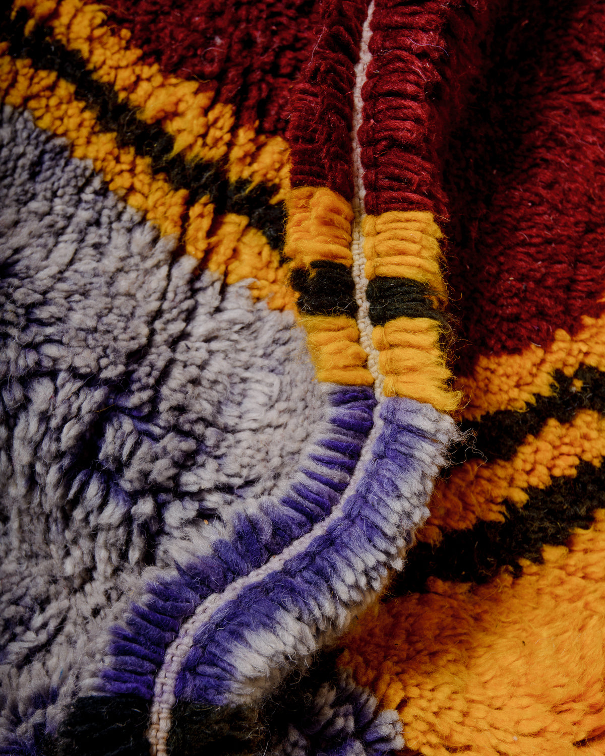 Close up detail of plush wool pile showing the density of the knots.